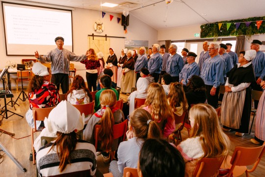 Afbeelding Zingende senioren laten kinderen een wereld zien die voor hen onzichtbaar is