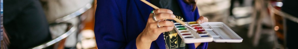 Achtergrondafbeelding Kunstenaar in de klas